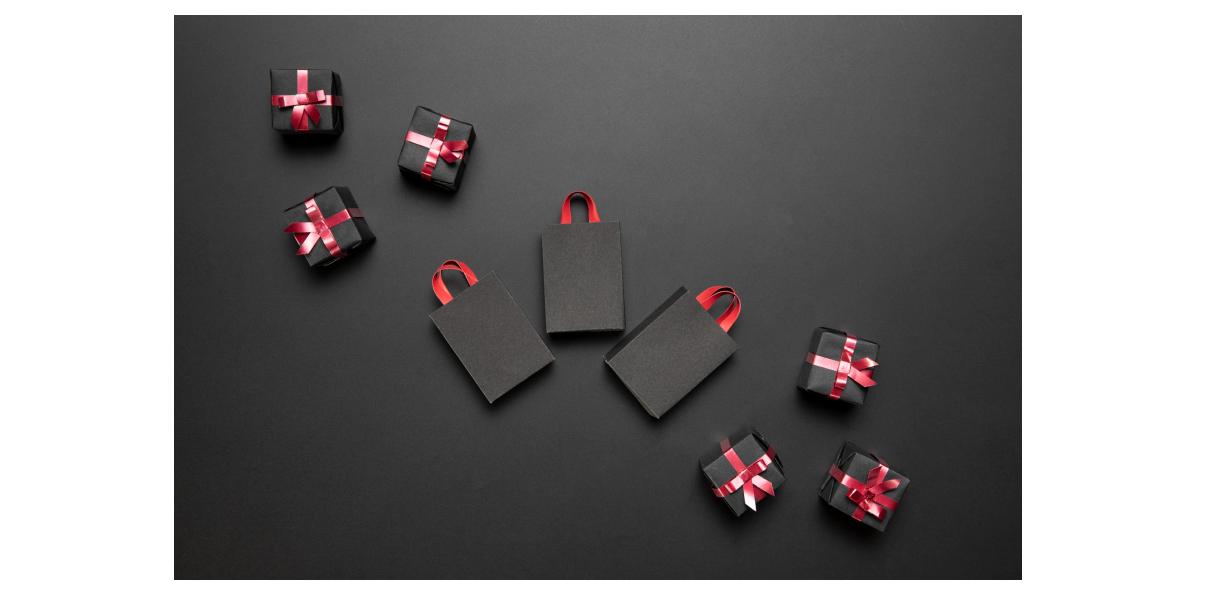 črna poslovna darila z rdečimi mašnjami